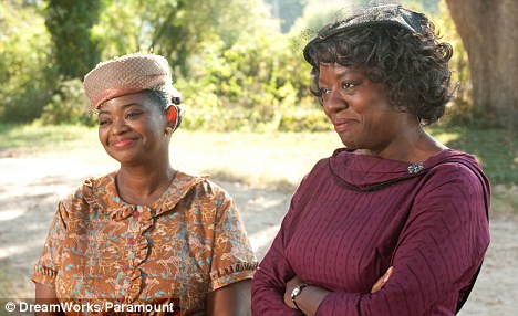 The Help: In Jackson, Mississippi in 1963, Aibileen Clark (Viola Davis, left) and Minny Jackson (Octavia Spencer) take a risk that could have profound consequences for them both  Read more: http://www.dailymail.co.uk/femail/article-2033369/Her-family-hired-maid-12-years-stole-life-Disney-movie.html#ixzz2iveYZkjE  Follow us: @MailOnline on Twitter | DailyMail on Facebook